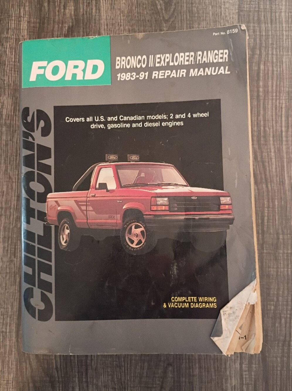 Ford Black and Teal Automotive Repair Manual Cover
